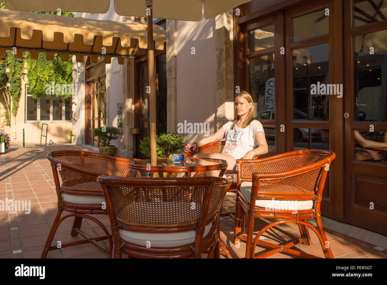 Lady sits in chair hi-res stock photography and images - Alamy