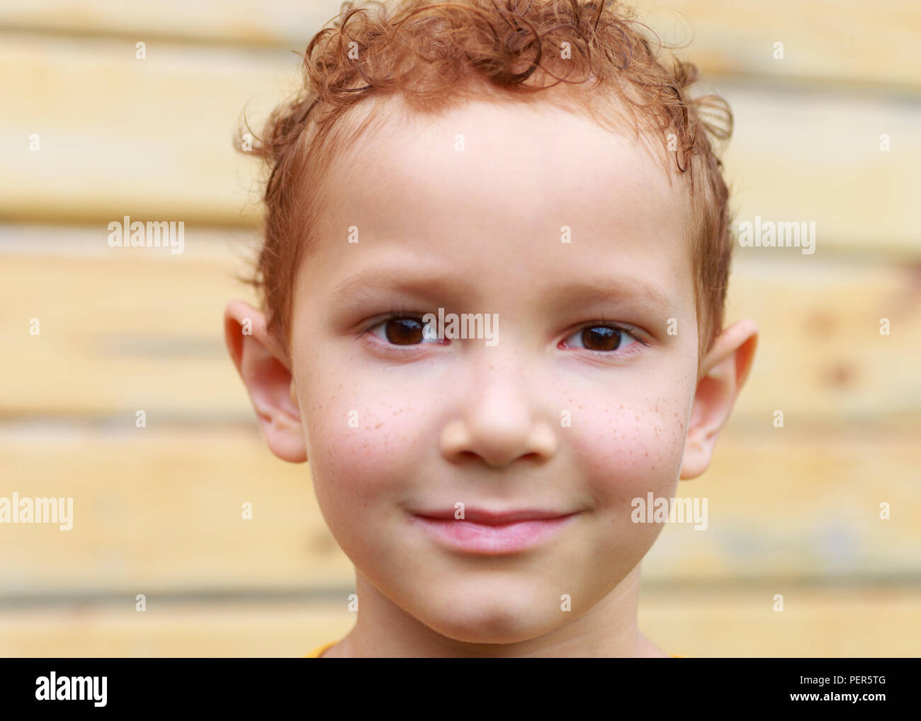 close up portrait of funny redhead boy with freckles Stock Photo