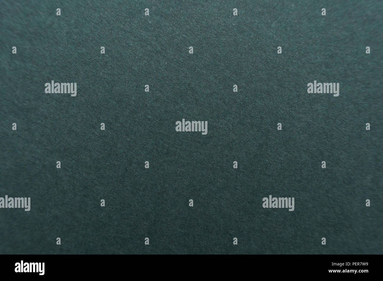 Dark green color cardboard texture desktop background Stock Photo