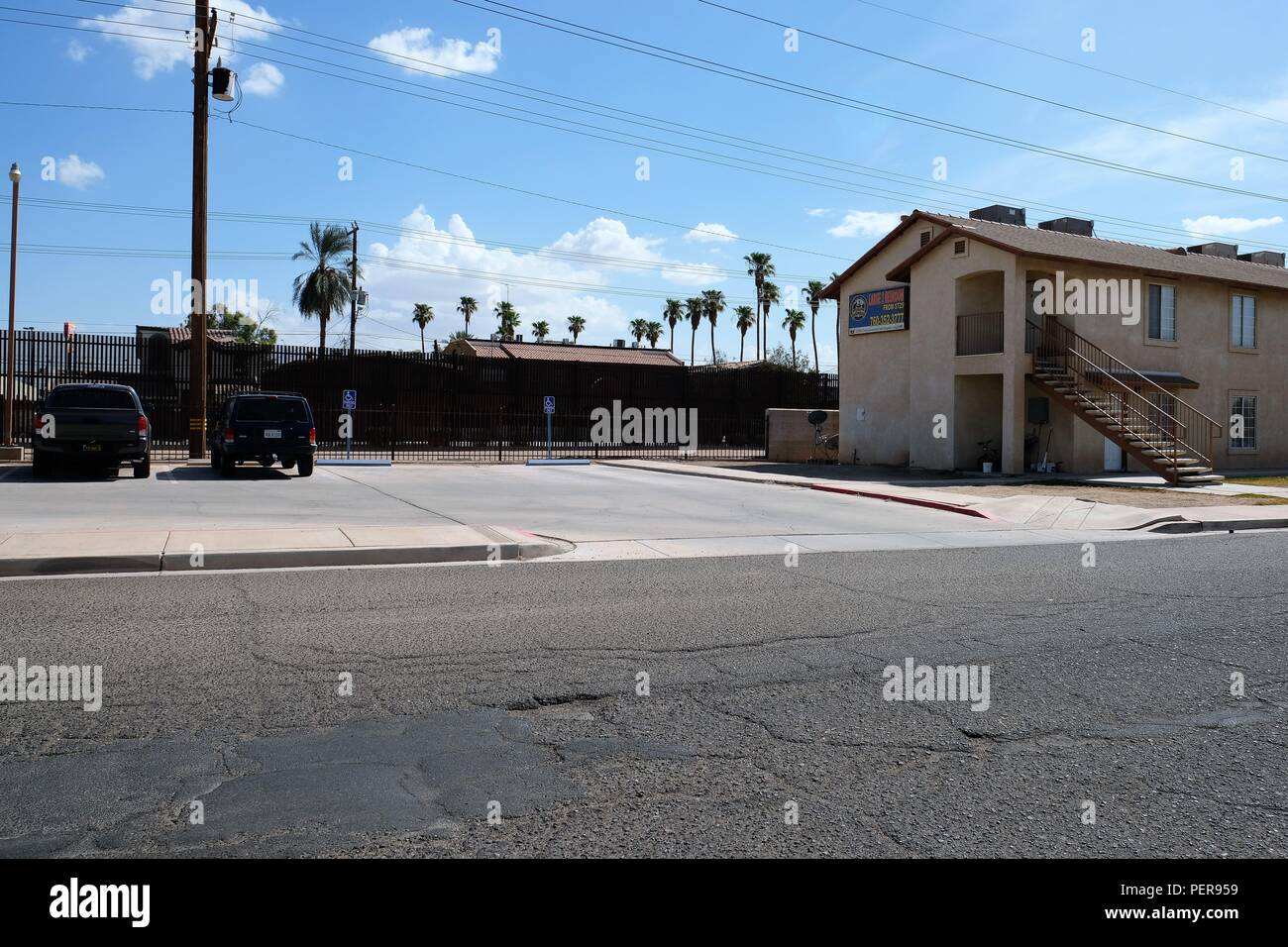 Borderview Apartments building, with a for rent sign, and the border
