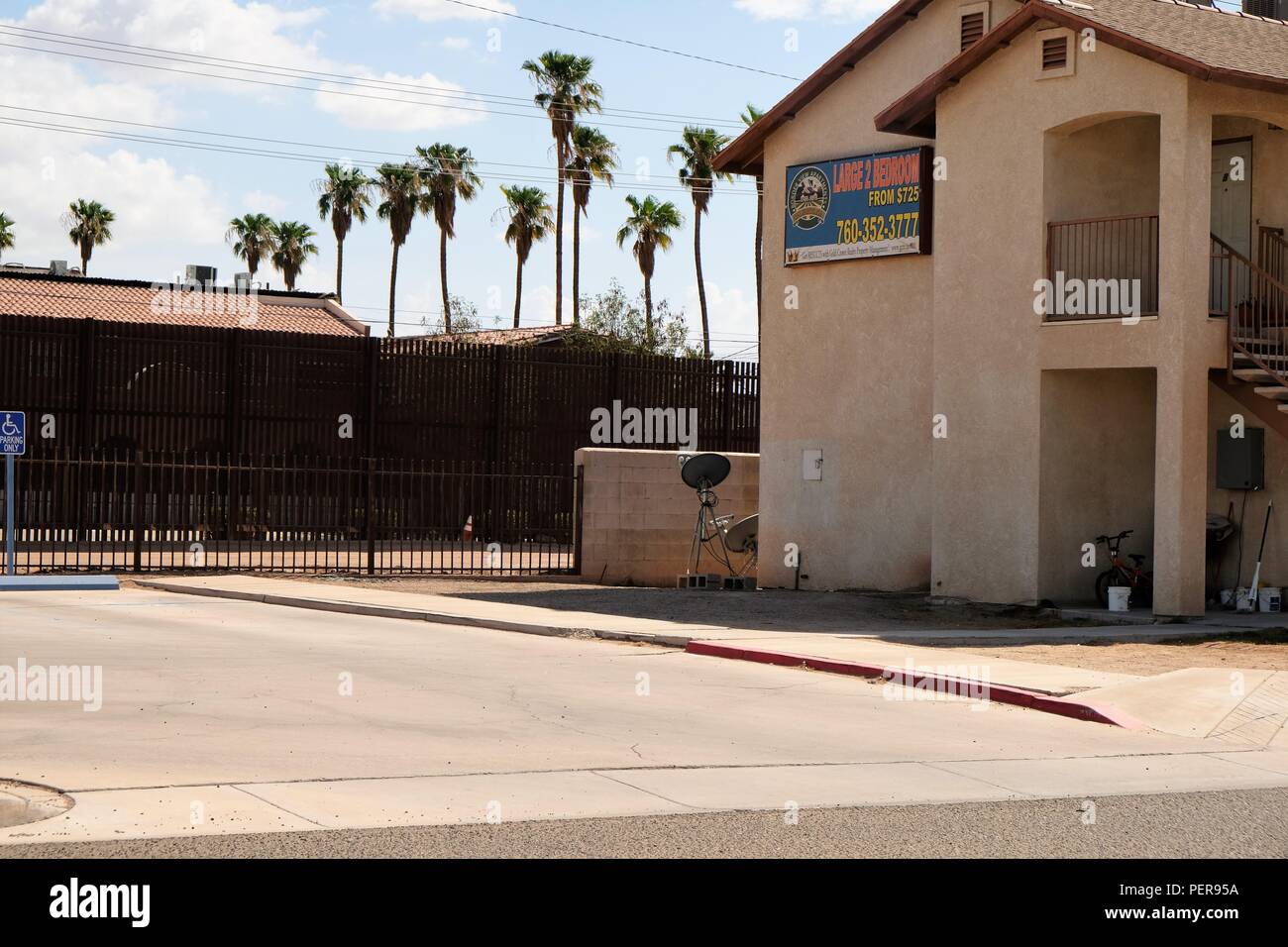 Borderview Apartments building, with a for rent sign, and the border