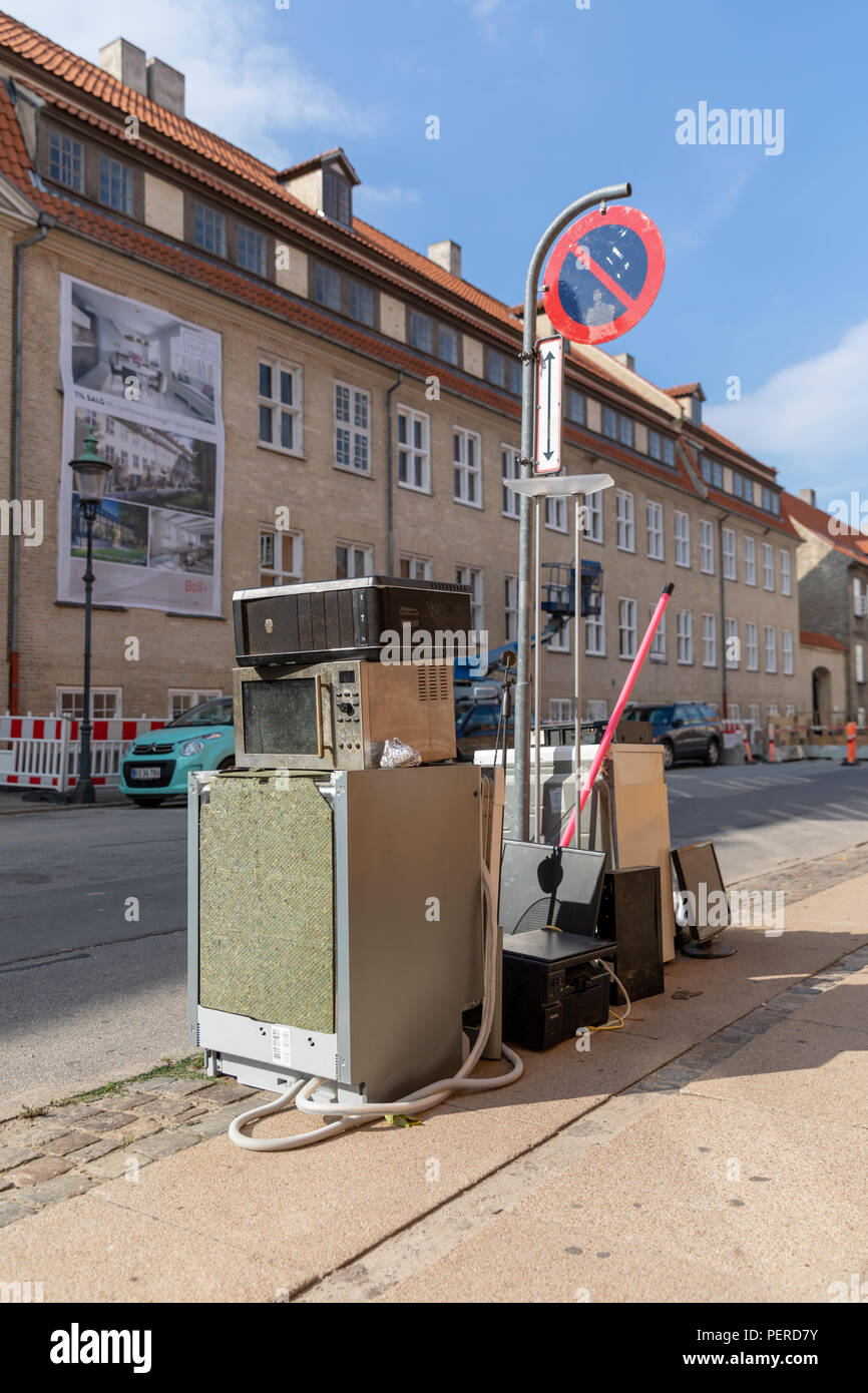 Discarded household electronics in the street Stock Photo