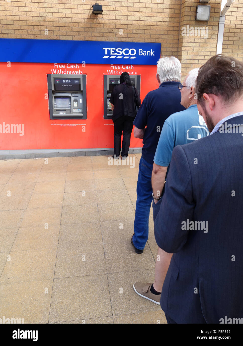 Waiting turn people in queue hi-res stock photography and images - Alamy