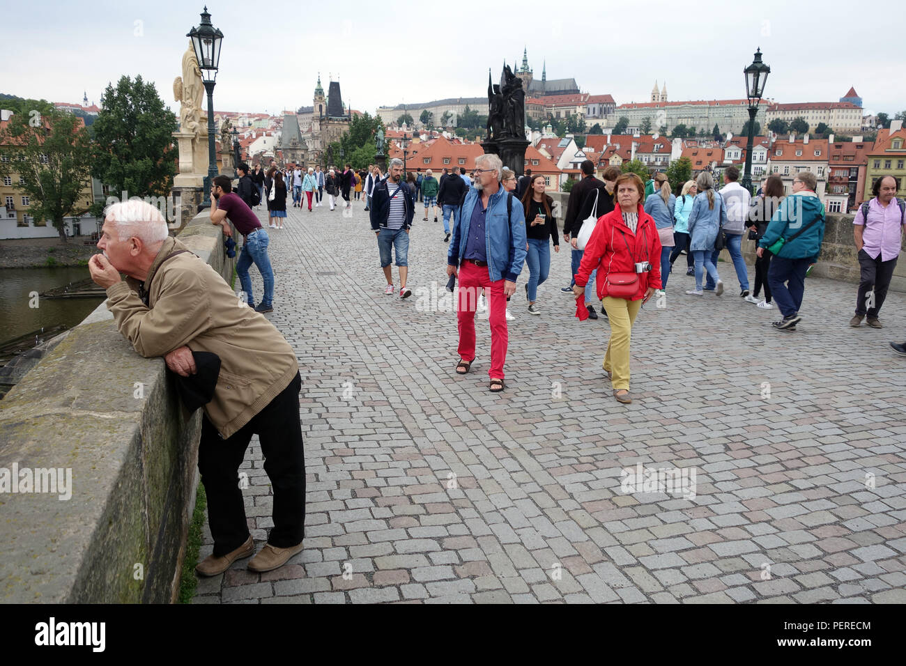 People Walking Across Bridge High Resolution Stock Photography and