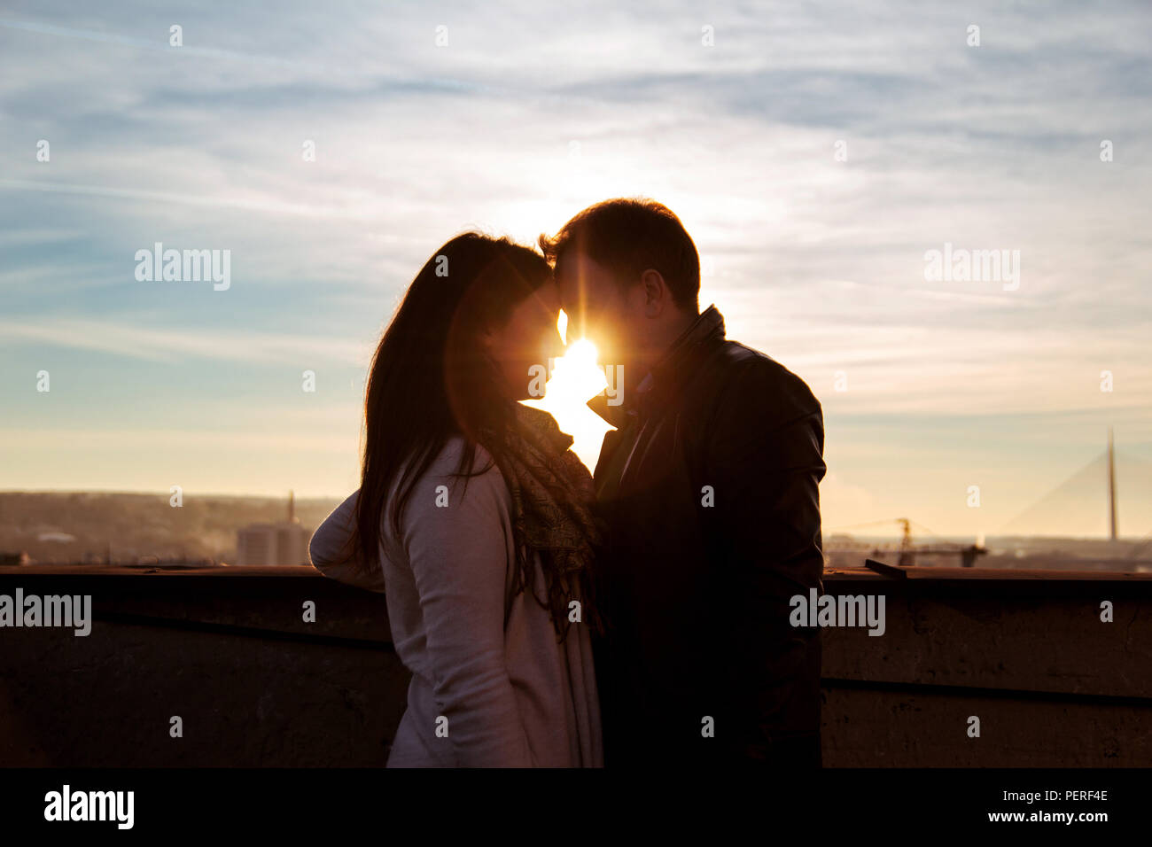 Silhouette couple embracing other hi-res stock photography and images ...