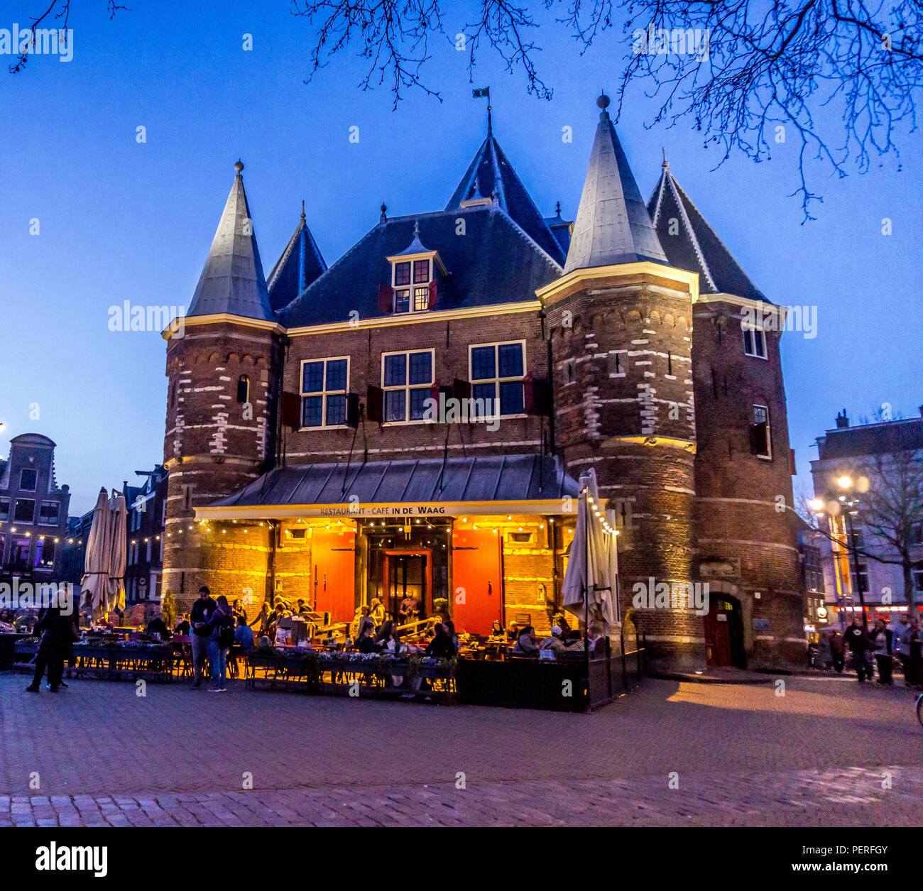 Cafe In de Waag, at night, Nieuwmarkt 4, 1012 CR Amsterdam, Netherlands Stock Photo
