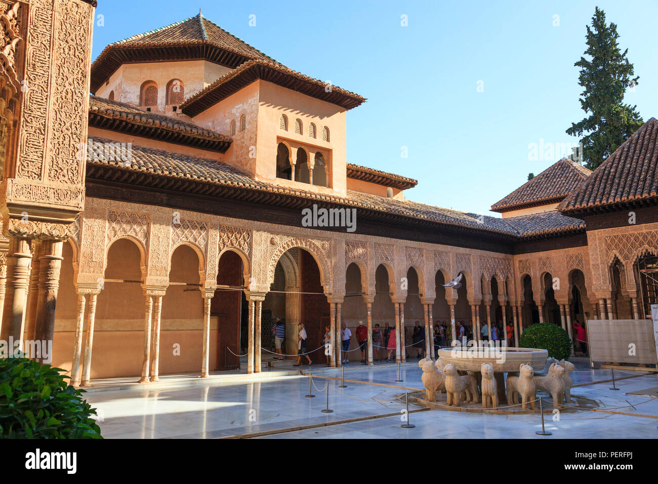 The Court Of The Lions And Fountain At The Alhambra Palace In Granada the-court-of-the-lions-and-fountain-at-the-alhambra-palace-in-granada
