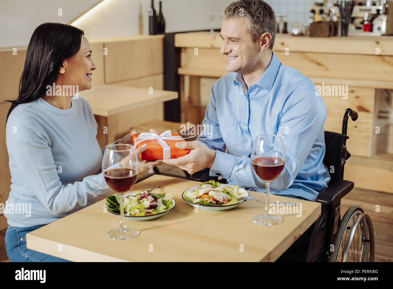 Beautiful woman getting a present Stock Photo