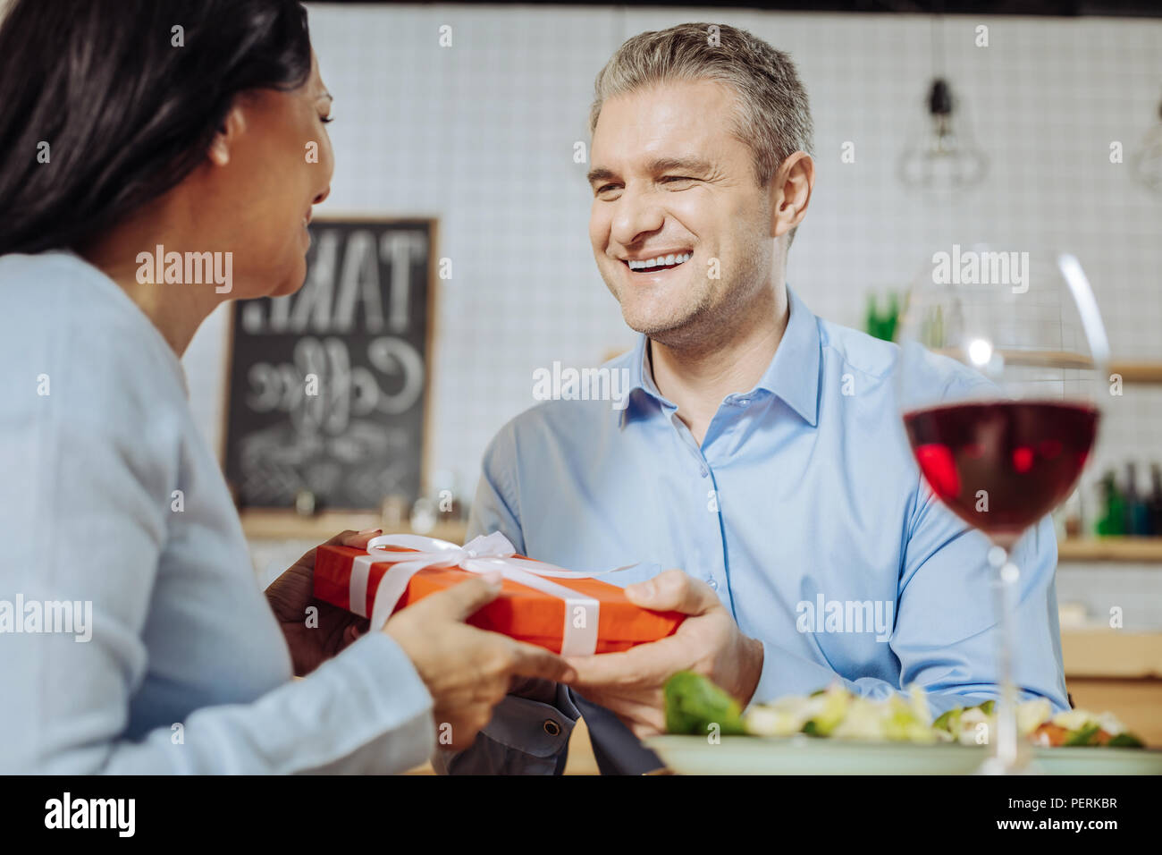 Cheerful man and woman celebrating a holiday Stock Photo