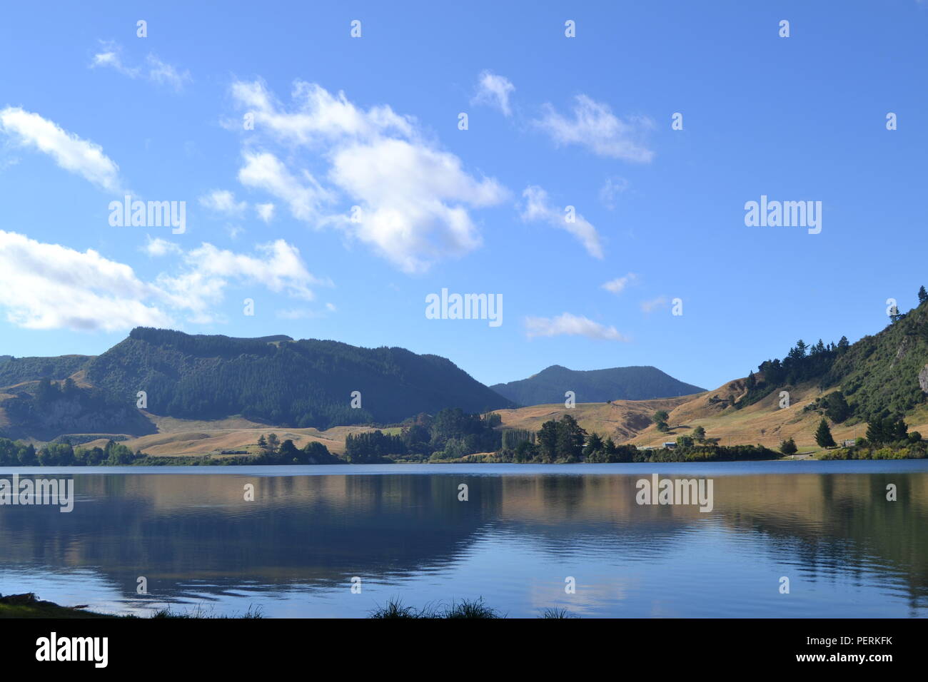 New zealand lake reflection near water Stock Photo