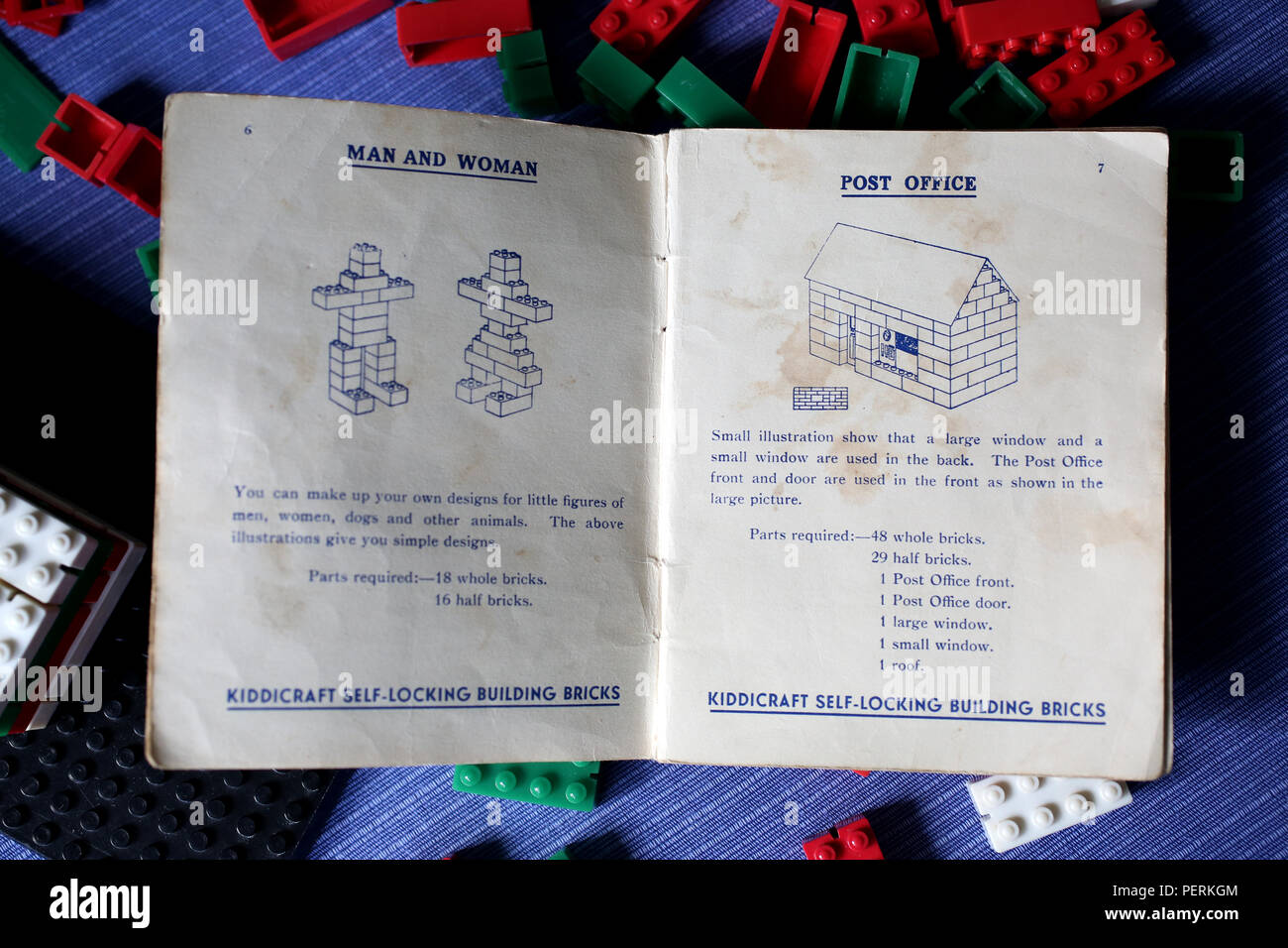 A collection of Kiddicraft brick toys from the 1940s with instructions and picture cards and Hilary Page Design inside. Sussex, UK. Stock Photo