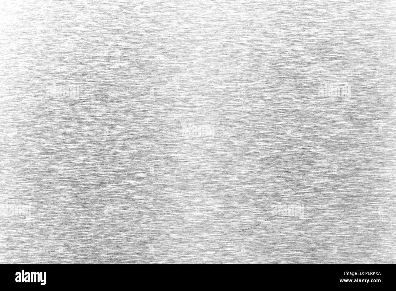 Shiny silver leaf gray foil texture background. Stock Photo