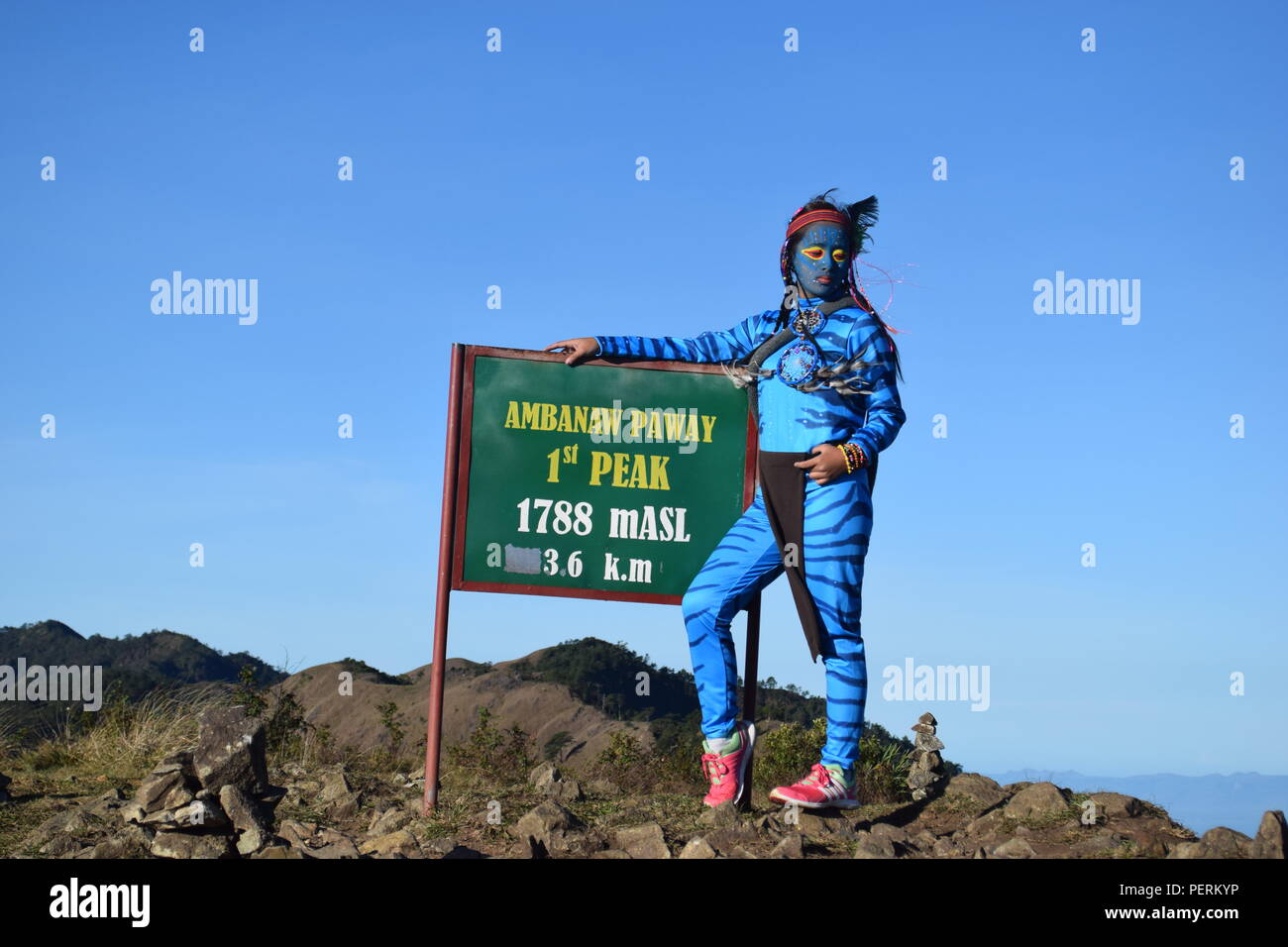 A young girl Feytiri arrived at Mount Ulap resting and recuperating from the long journey to earth and enjoy the sunrise at dawn in Ampucao Sta. Fe. Stock Photo