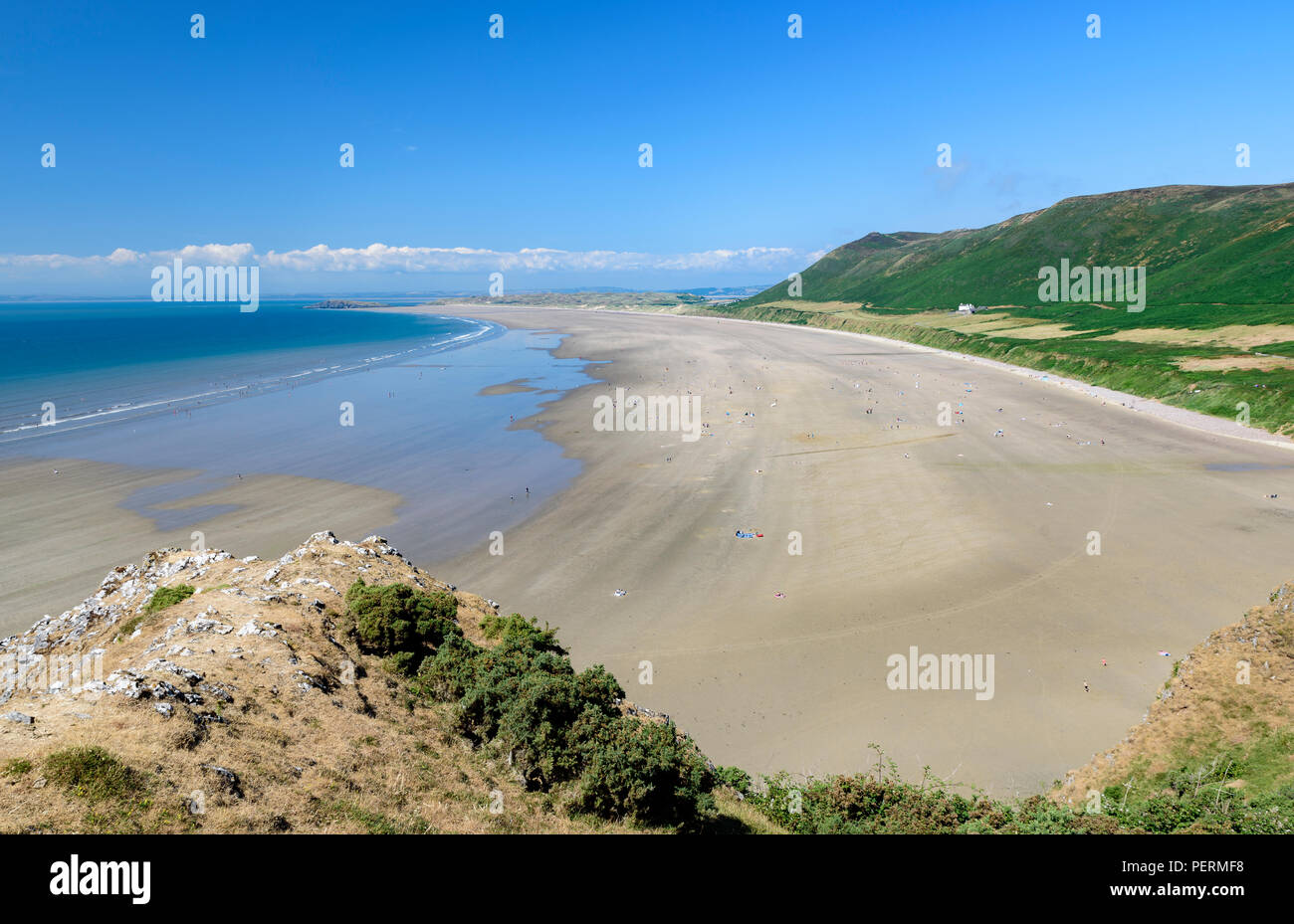 Rhossili Bay, the Gower, Wales, on a sunny summers day. Rhossili is located on the South Wales coast, and is considered one of the top beaches in the Stock Photo