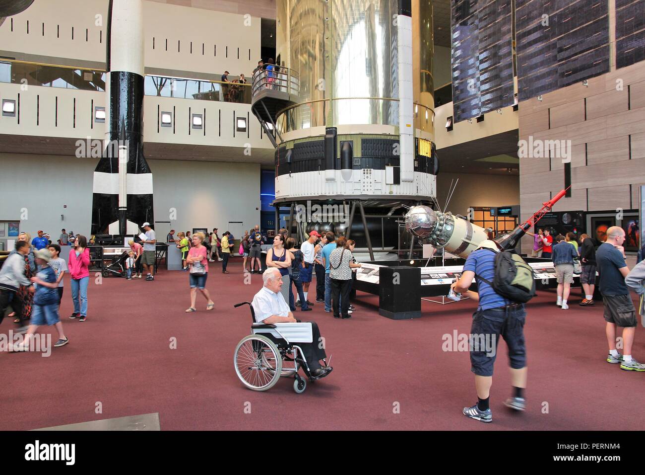 WASHINGTON - JUNE 13: People visit Smithsonian National Air and Space Museum on June 13, 2013 in Washington. It holds the largest collection of histor Stock Photo