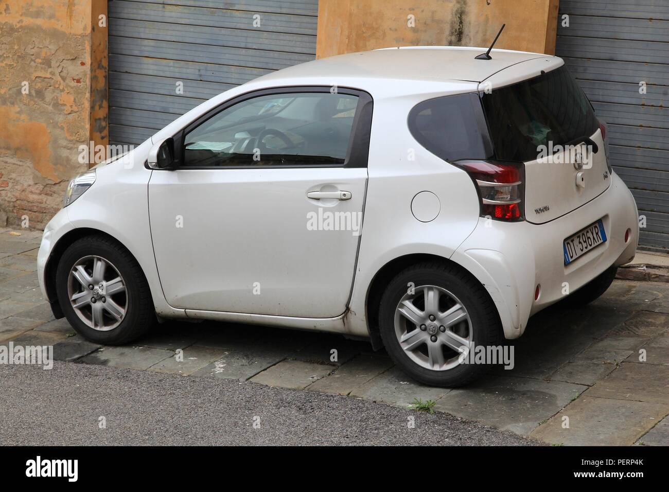 SIENA, ITALY - MAY 3, 2015: Toyota IQ city car parked in Siena, Italy. IQ is in production since 2008. Toyota is the 11th-largest company in the world Stock Photo