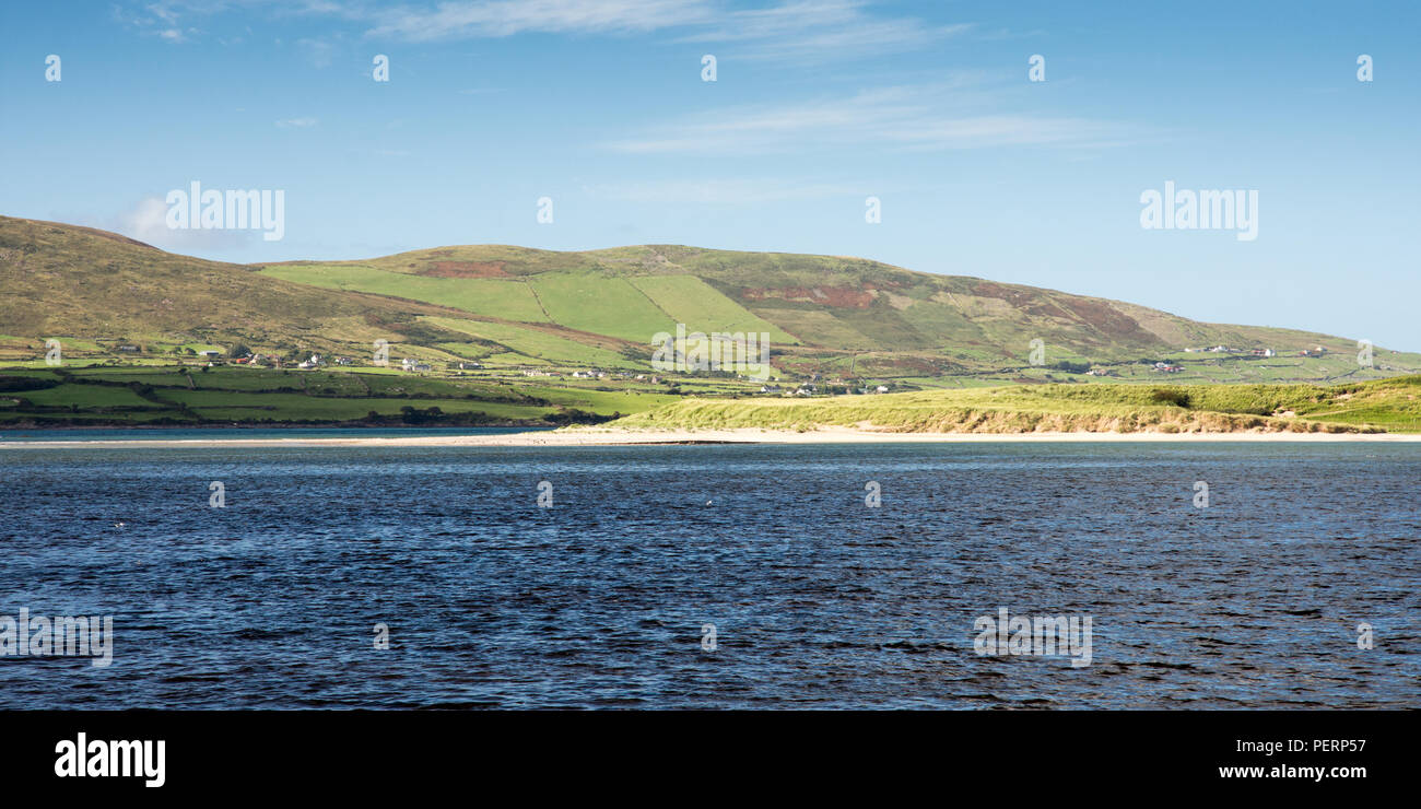 The Cloghane Estuary on Tralee Bay under the mountains of Ireland's Dingle Peninsula. Stock Photo