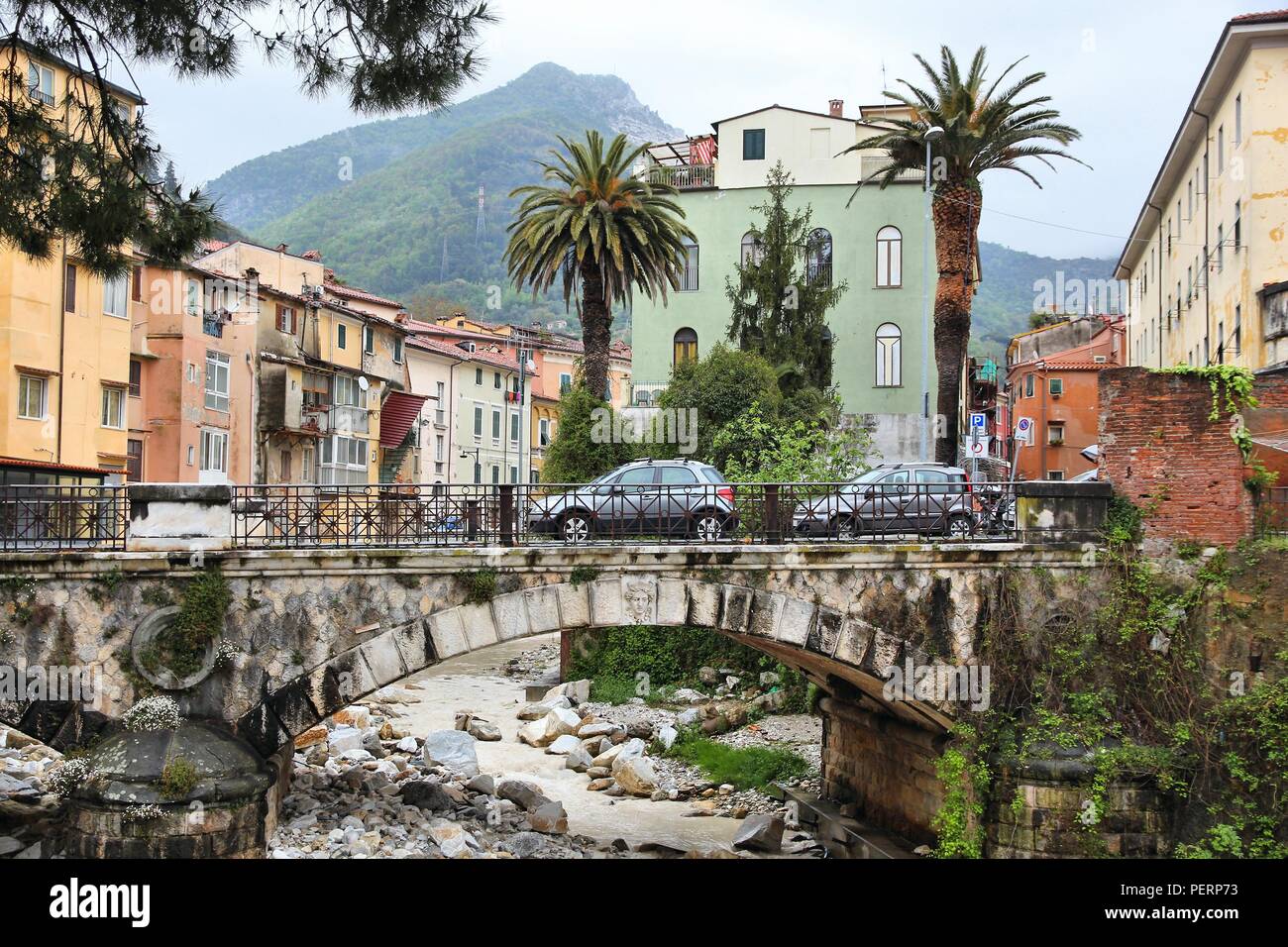 Carrara, Italy - Old Town in the region of Tuscany. River Carrione bridge. Stock Photo