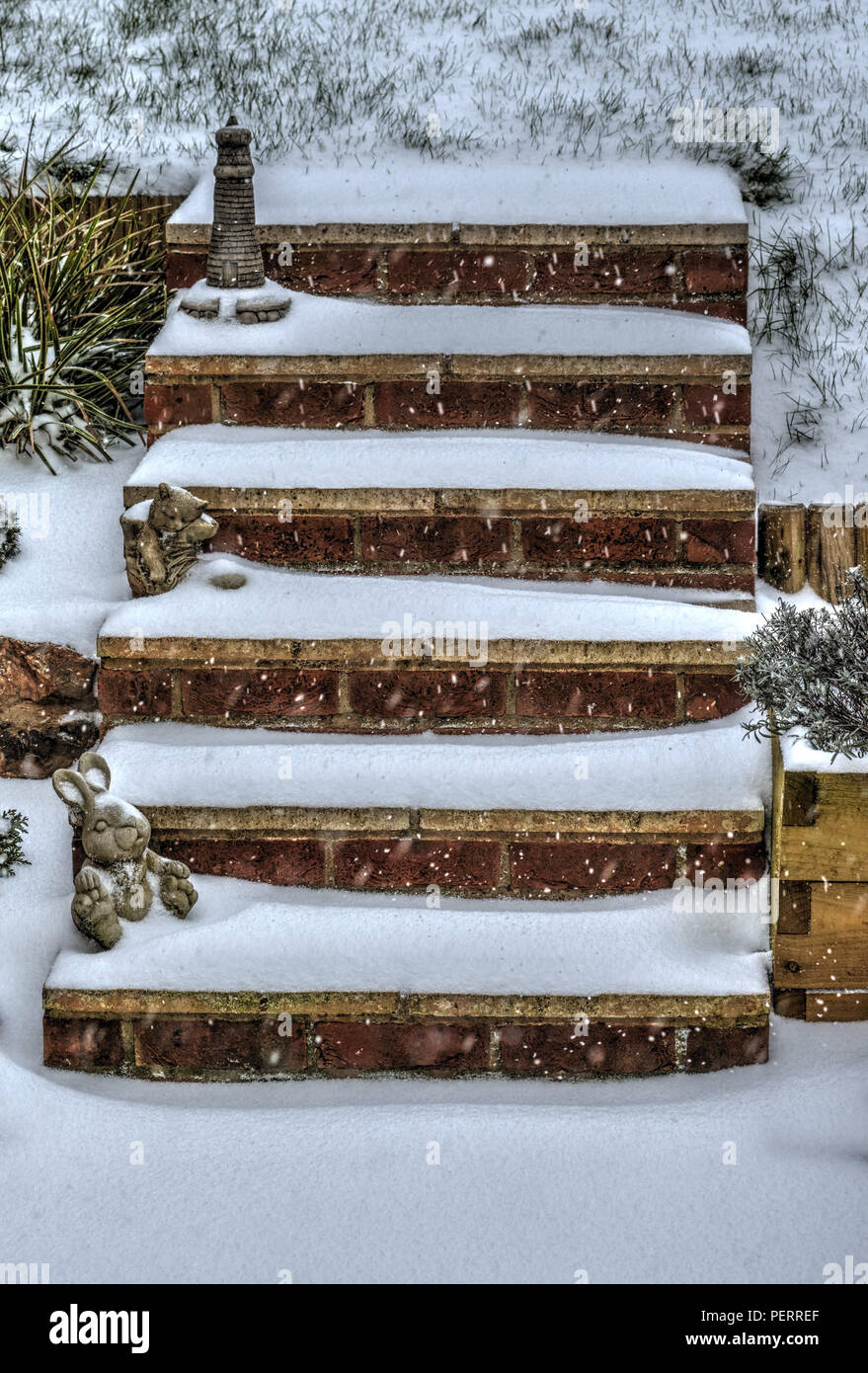 Snow on garden steps, processed as an HDR image Stock Photo - Alamy