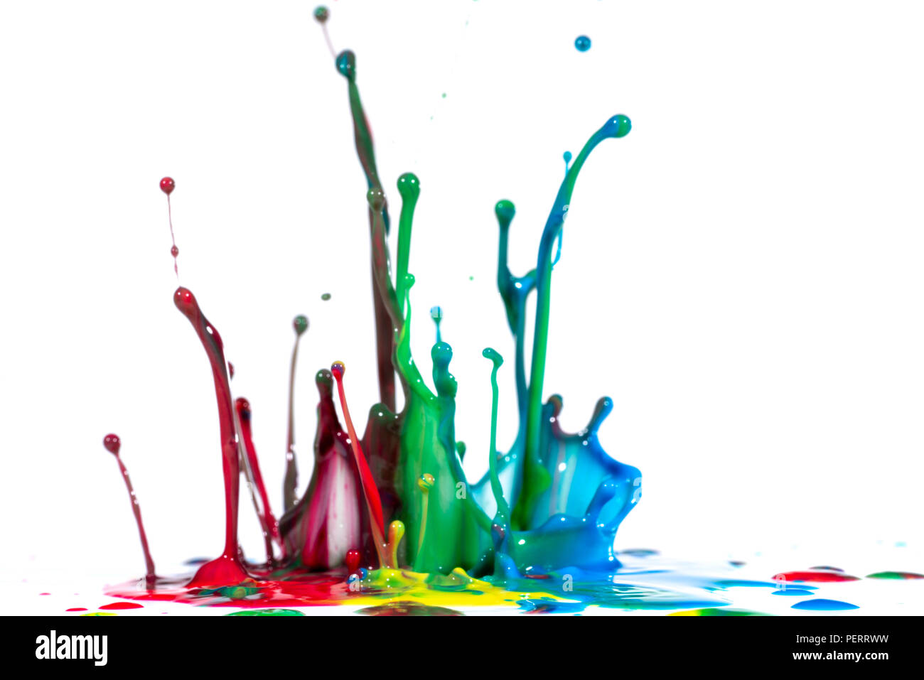 Splash of color ink on white background Stock Photo - Alamy