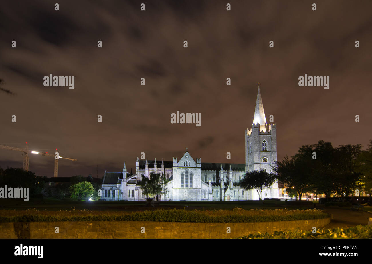 Dublin, Ireland - September 8, 2016: The exterior of Dublin's Roman Catholic St Patrick's Cathedral lit up at night. Stock Photo