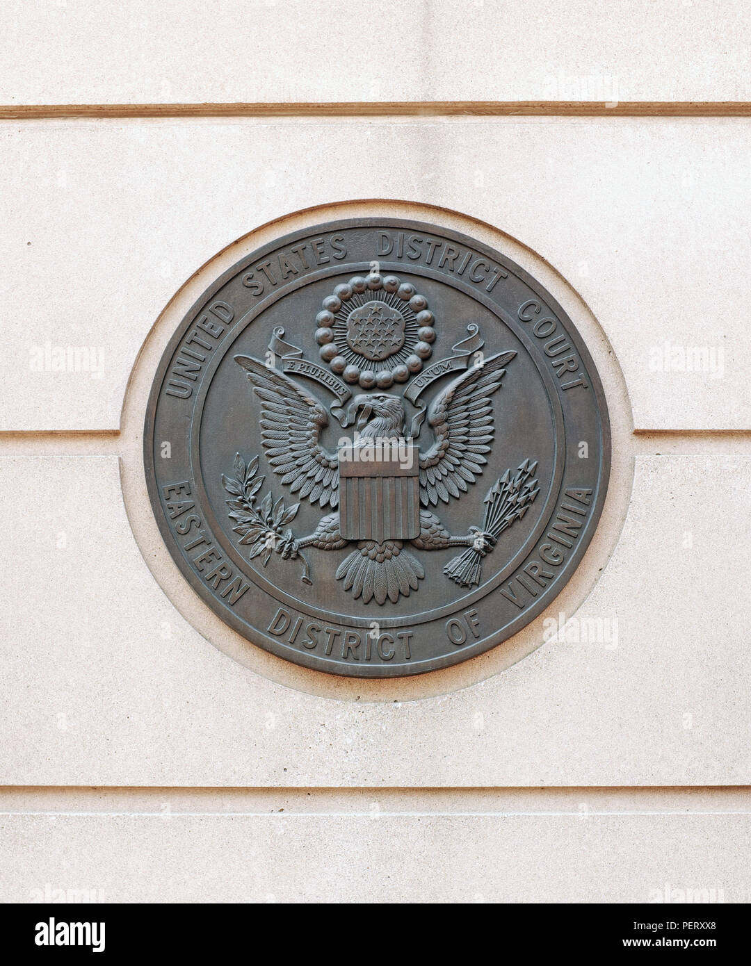 The United States District Court Eastern District of Virginia seal on the outside of the Alexandria, Virginia US Courthouse. Stock Photo