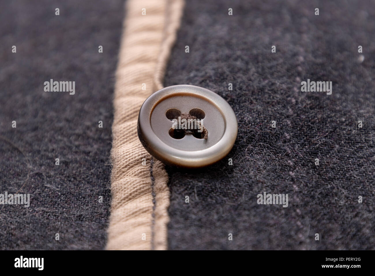 Mottled fabric denim style fine stuff soft material with button Stock Photo
