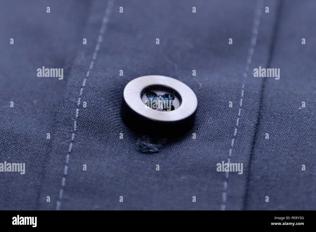Mottled fabric denim style fine stuff soft material with button Stock Photo