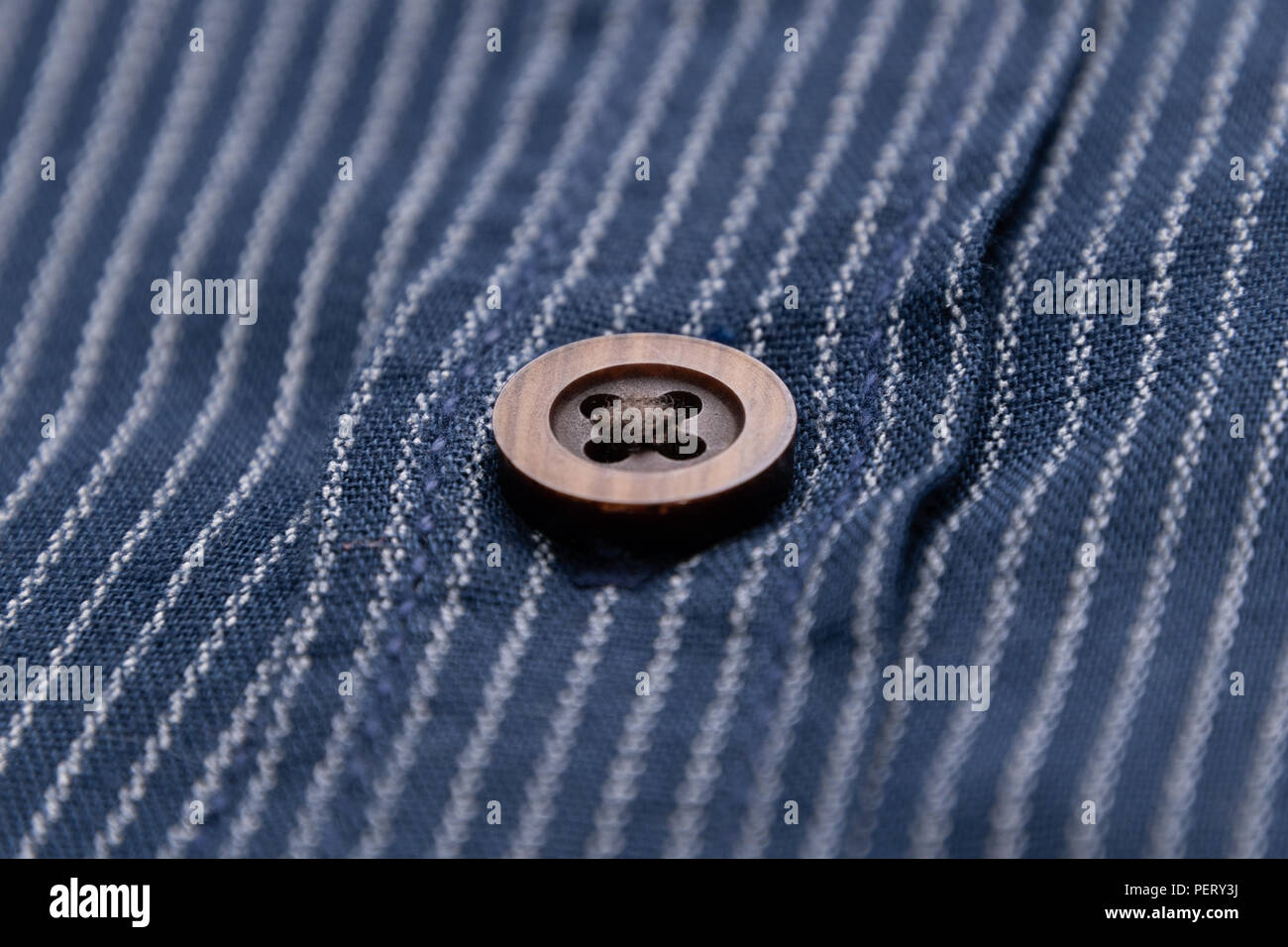 Mottled fabric denim style fine stuff soft material with button Stock Photo
