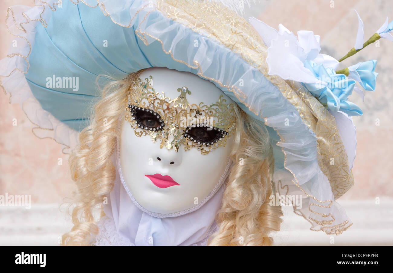 Reveller In Traditional Elaborate Mask And Costume At Venice Carnival (Carnevale di Venezia). Venice, Veneto, Italy, Europe Stock Photo