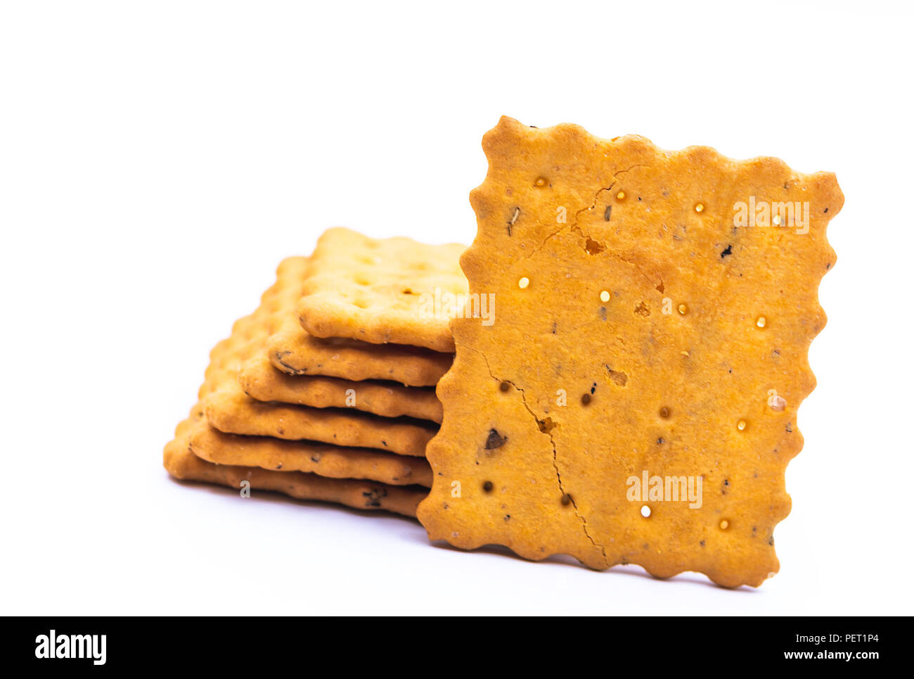 crackers or cookies on white Stock Photo Alamy