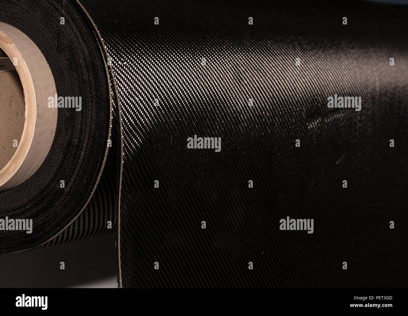 Carbon fiber rolled weave composite material industry Stock Photo