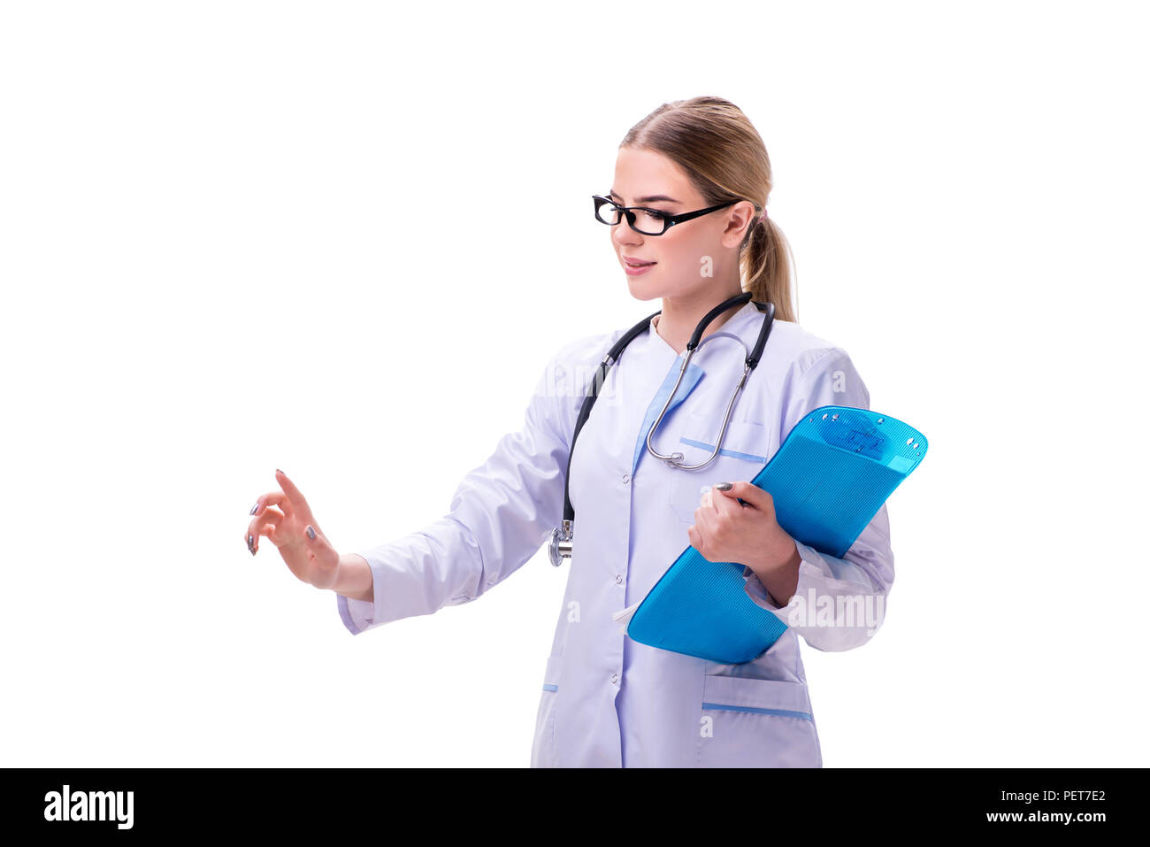 Young woman doctor isolated on white background Stock Photo - Alamy