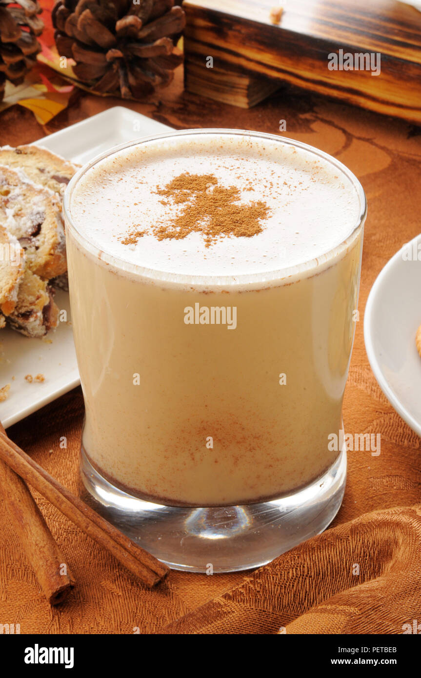 Homemade egg nog with nutmeg and cinnamon sticks Stock Photo Alamy