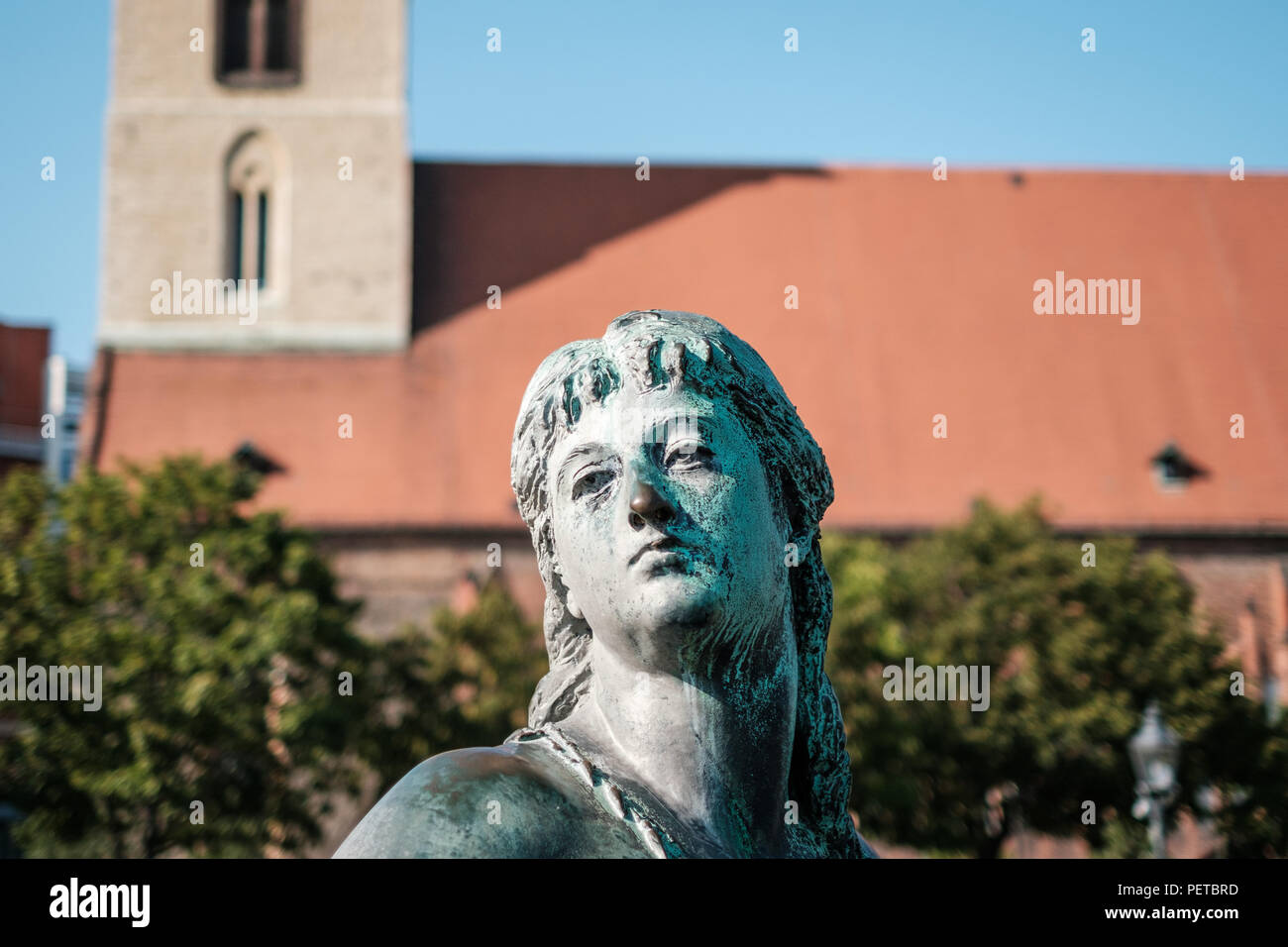 Portrait of a female statue face of girl sculpture , Neptune Fountain