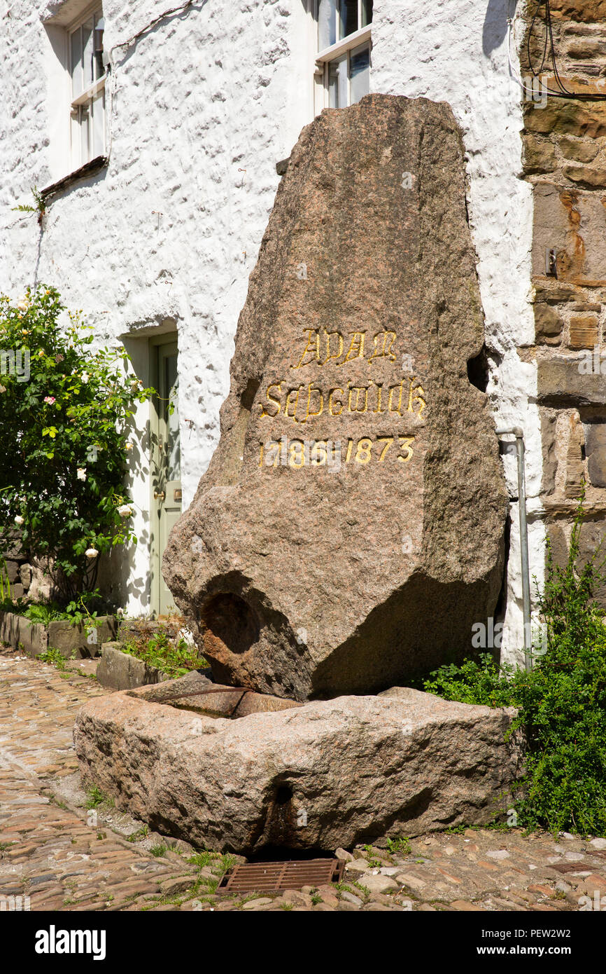 UK, Cumbria, Dentdale, Dent, Main Street, geologist Adam Sedgwick stone