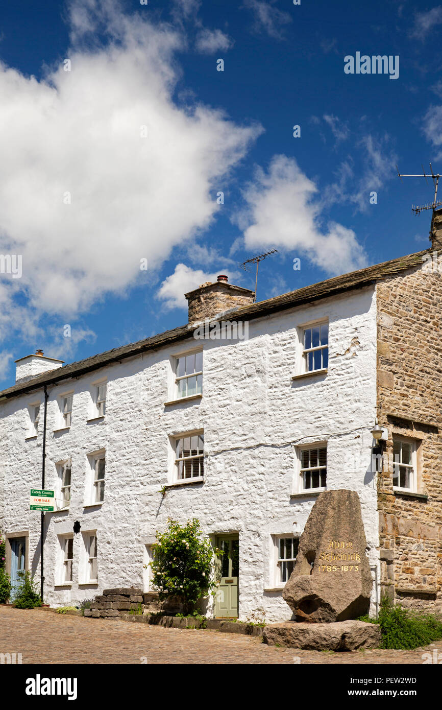 UK, Cumbria, Dentdale, Dent, Main Street, geologist Adam Sedgwick stone