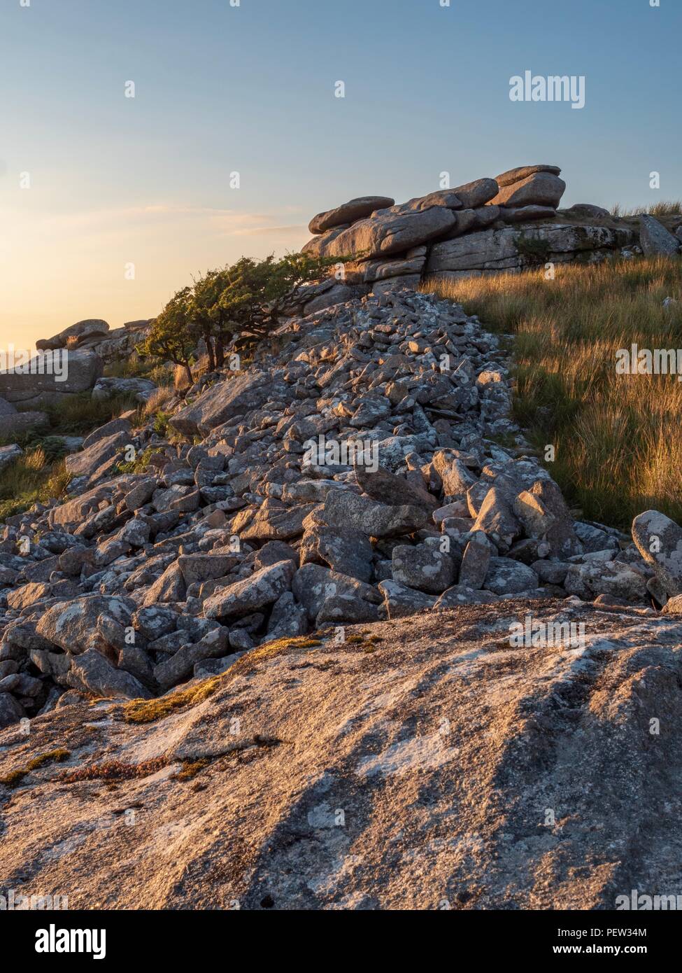 Fallen rocks littering the hill at the Cheesewring in Bodmin, Cornwall Stock Photo