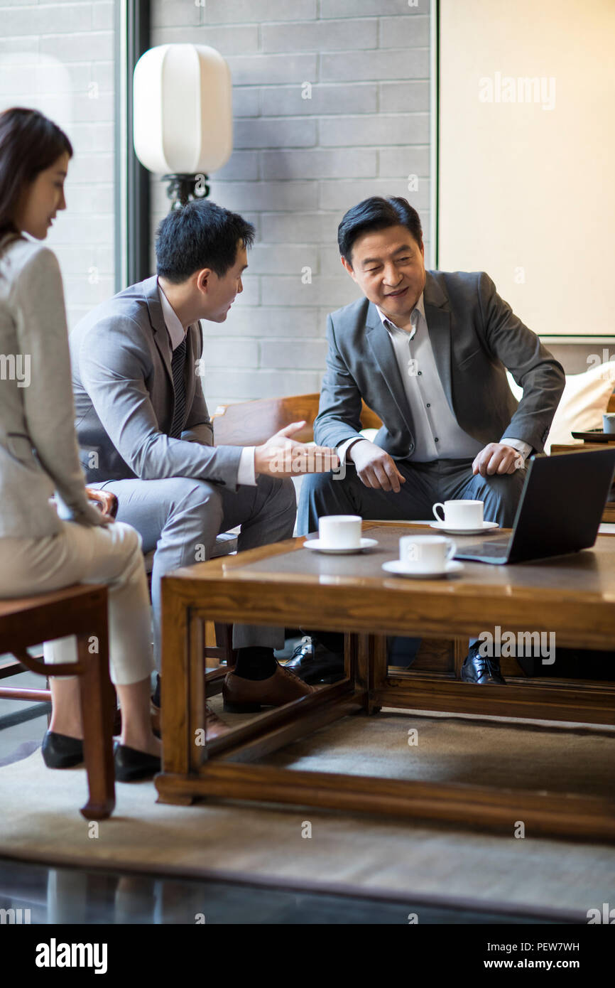 Business people having a meeting Stock Photo - Alamy