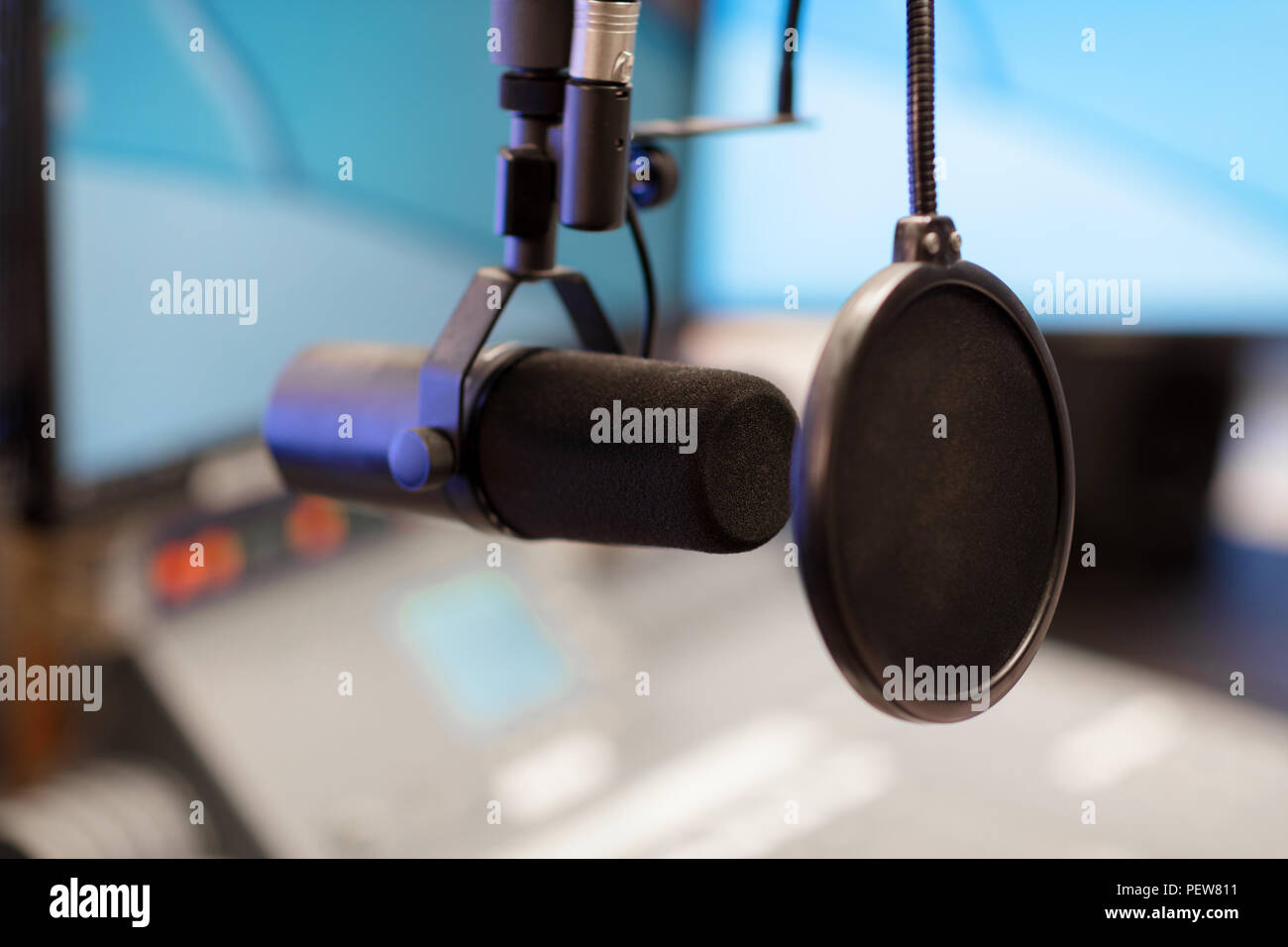 Microphone in modern radio station broadcasting studio Stock Photo