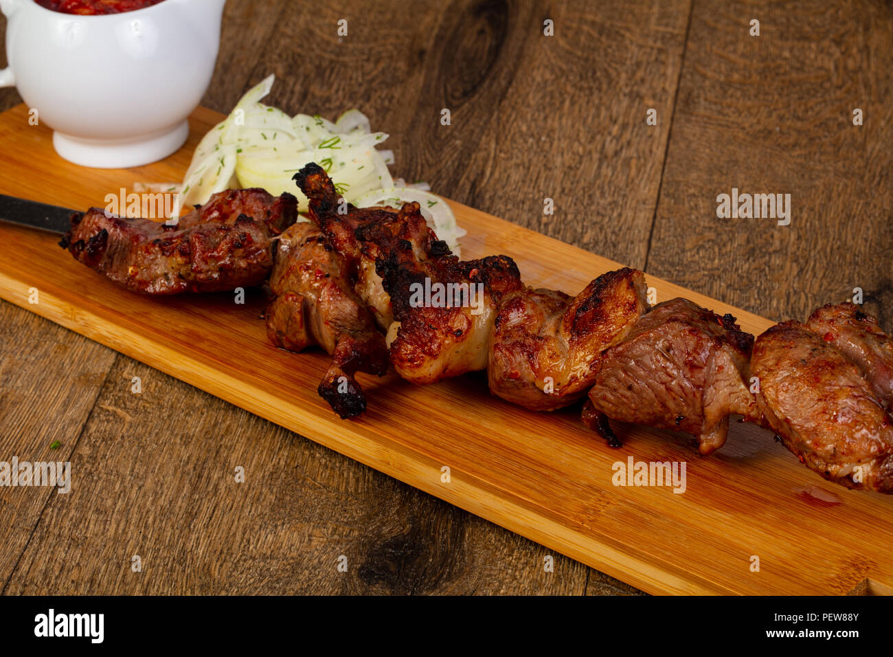 Grilled beef kebab bbq with sauce and onion Stock Photo Alamy
