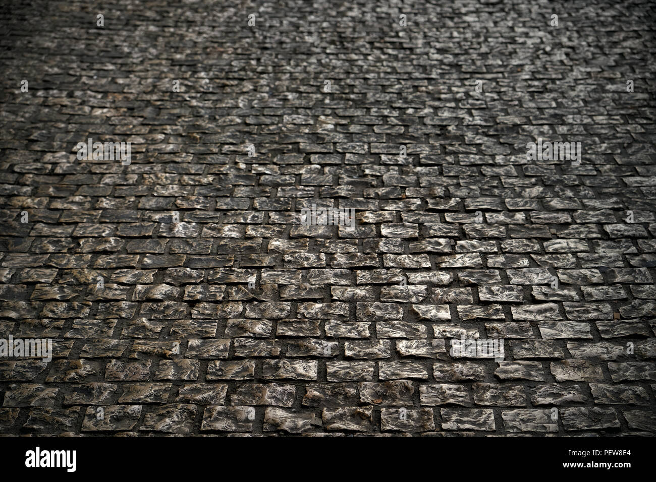 old grunge cobble stone road surface background texture Stock Photo - Alamy