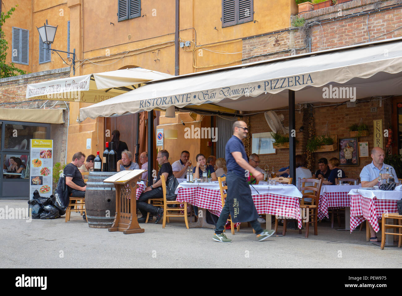 People are dining on the terrace of Restaurant 'San Domenico' in Siena, Tuscany, Italy Stock Photo