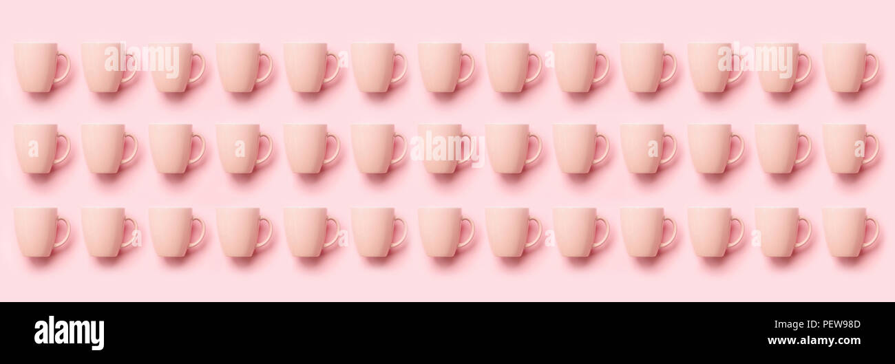Pattern From Pink Paper Drinking Cups Arranged Diagonally On Mint