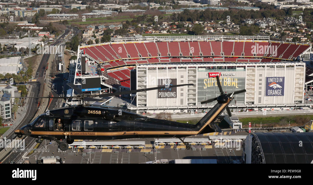 A . Customs and Border Protection Black Hawk helicopter flies over Levi's  Stadium, the site of Super Bowl 50, in Santa Clara, Calif., Feb. 1, 2016.  (. Customs and Border Protection Photo