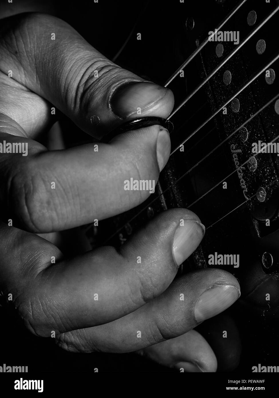Playing guitar close up Stock Photo