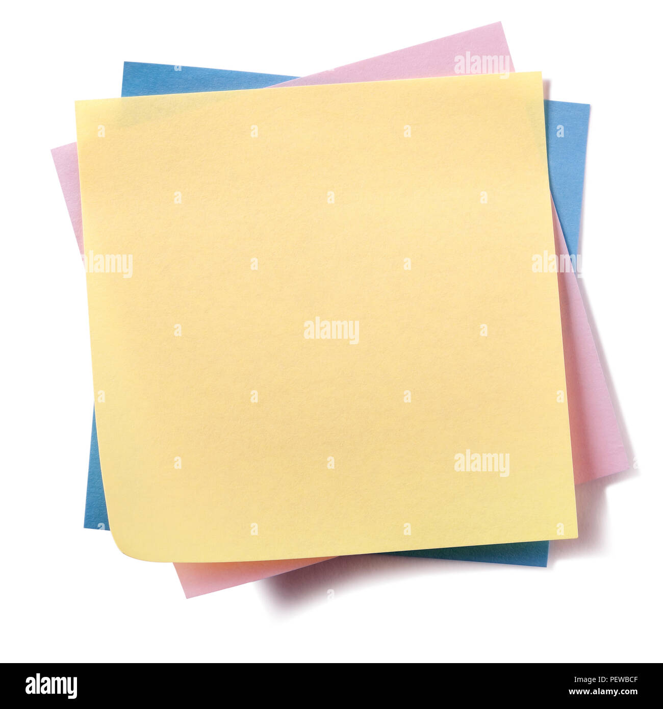 Untidy stack various different colors sticky post notes isolated on white Stock Photo