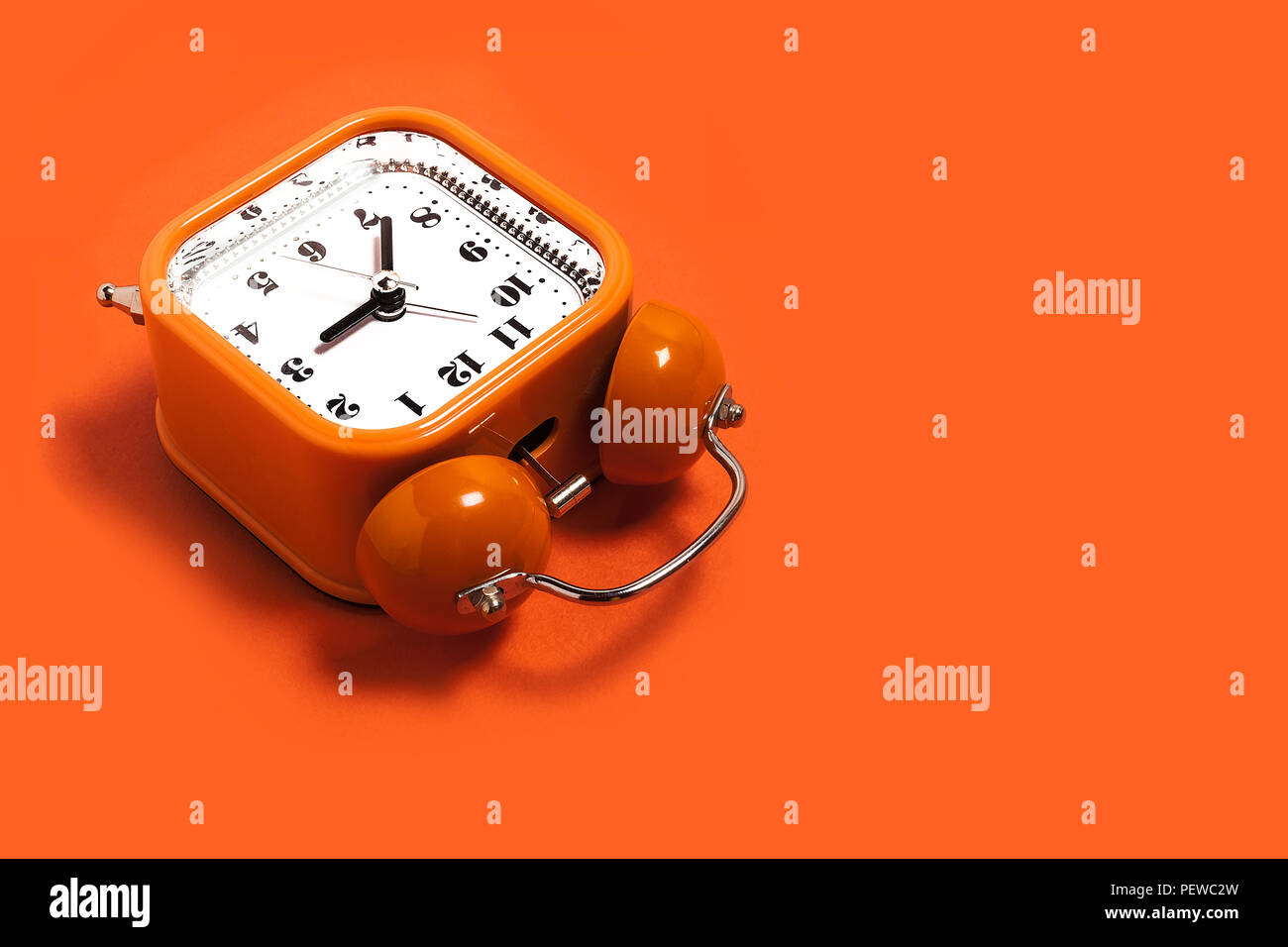 orange vintage alarm clock Stock Photo Alamy