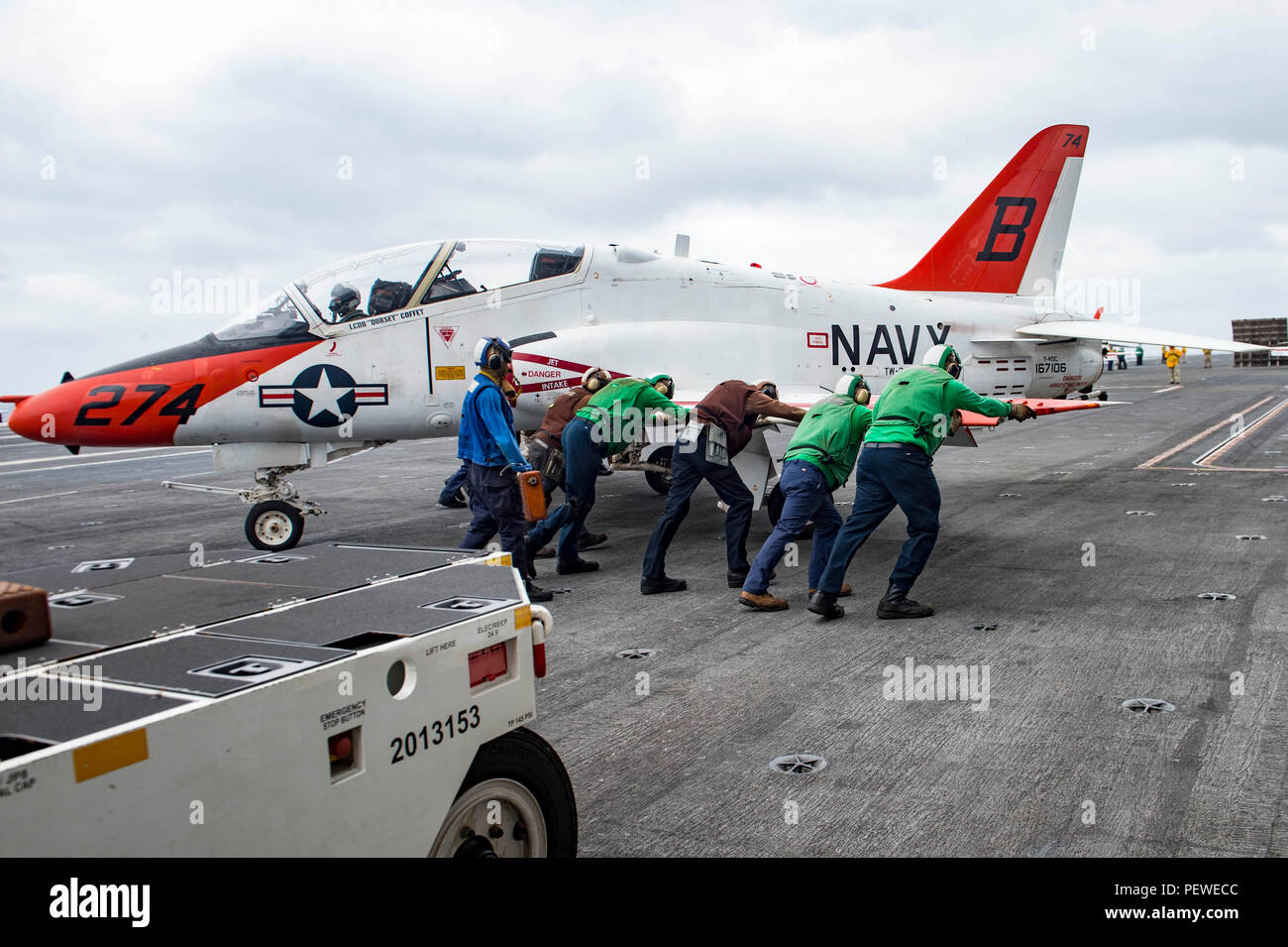 Goshawk Fast Jet Sailors move a McDonnell Douglas T‑45C Goshawk jet trainer on the ...