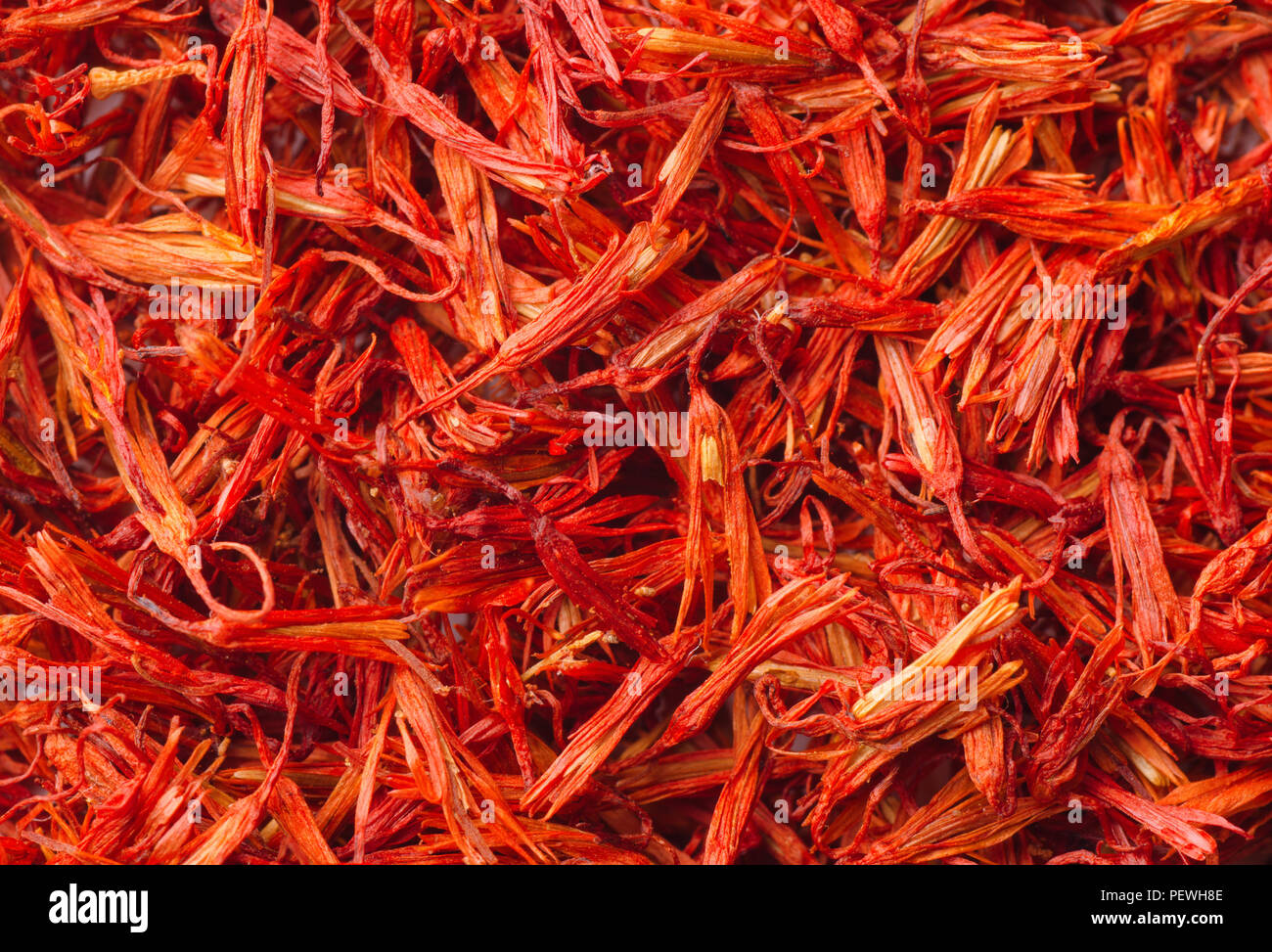 Close up of saffron threads background Stock Photo